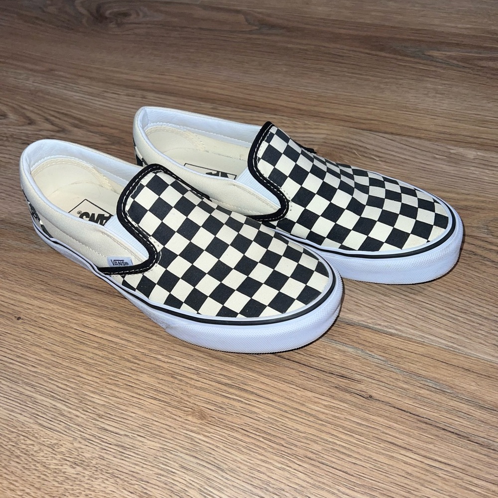 Vans Women’s Black and White Checkered Slip-On Sneakers
